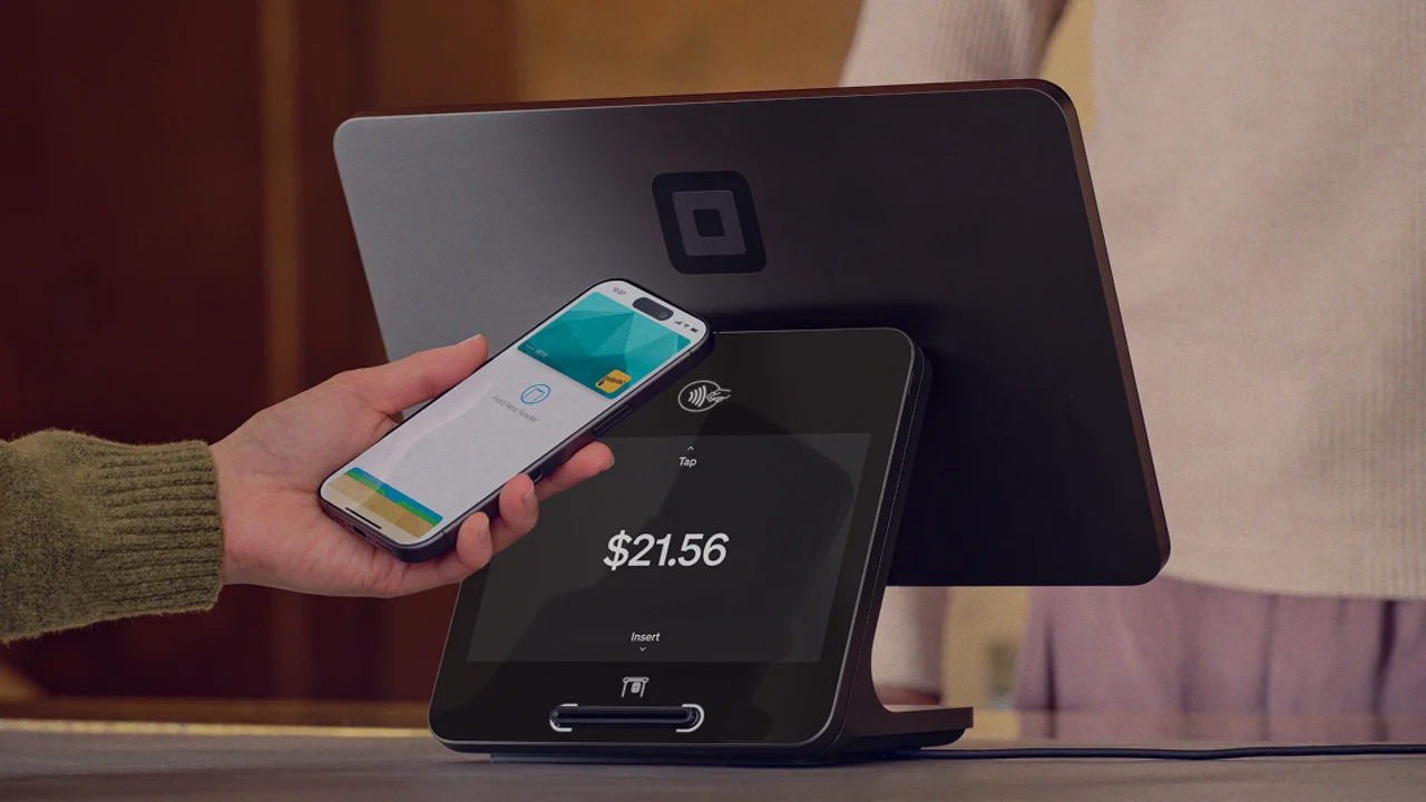 Square Register accepting a contactless payment at a point-of-sale counter